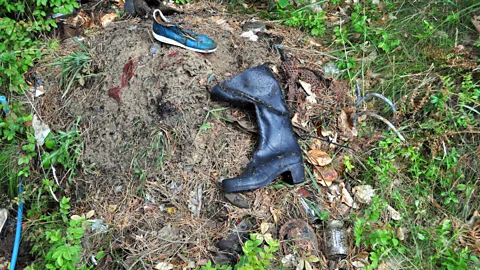 Grzegorz Kiarszys Military paraphernalia mixed with quotidian waste. "They were several kilometres from the nearest villages and the largest garrisons," says Kiarszys (Credit: Grzegorz Kiarszys)