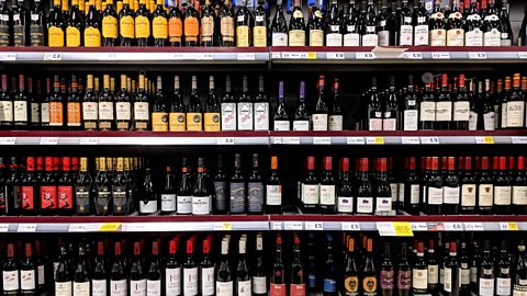 supermarket shelves filled with wine