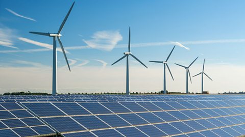 Solar panels and wind turbines.