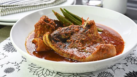 i'am/Getty Images Peranakan dishes like ikan asam pedas (spicy tamarind fish) can be sour, spicy and bursting with umami (Credit: i'am/Getty Images)