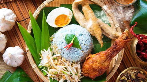 szefei/Getty Images Peranakan food (pictured: Nasi kerabu) is often considered one of Southeast Asia's first fusion cuisines (Credit: szefei/Getty Images)