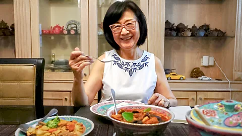 Rachel Phua Elizabeth Ng learned to cook Peranakan food from her grandmother and now teaches classes in her Singapore home (Credit: Rachel Phua)