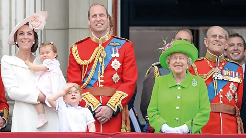 Getty Images At her official 90th birthday celebration in 2016, the Queen offered a colour blocking masterclass – in dazzling neon green (Credit: Getty Images)