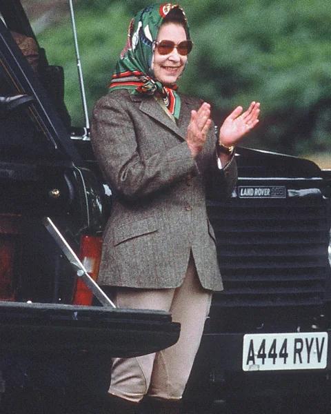 Getty Images The Queen's enduring off-duty look, shown here at the 1988 Royal Windsor Horse Show, has been much copied by fashionistas (Credit: Getty Images)