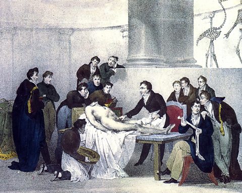 A corpse is dissected in an anatomy lesson as depicted in a French engraving from 1826.