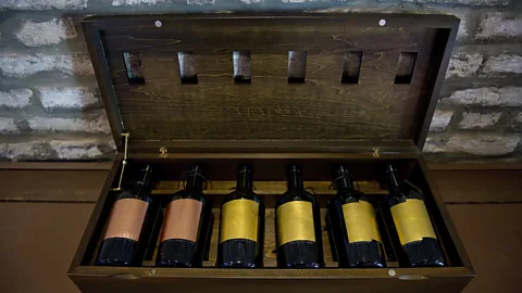 Awakening/Getty Images Honouring two more Venetian traditions, Venissa's hand-blown wine bottles display hand-beaten gold leaf (Credit: Awakening/Getty Images)
