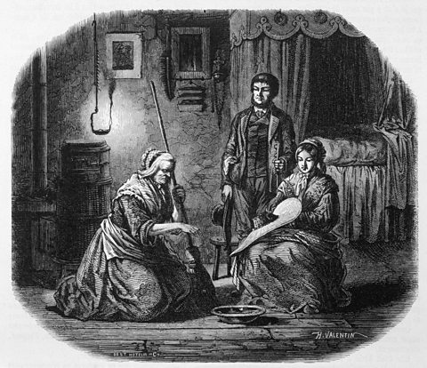 A French engraving showing a wise woman using magic to discover who has cast an evil spell on her client.