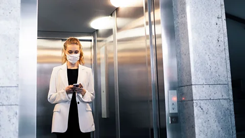 Getty Images It can be extremely alienating for immunocompromised workers to be the only ones wearing masks when the rest of the office isn't (Credit: Getty Images)