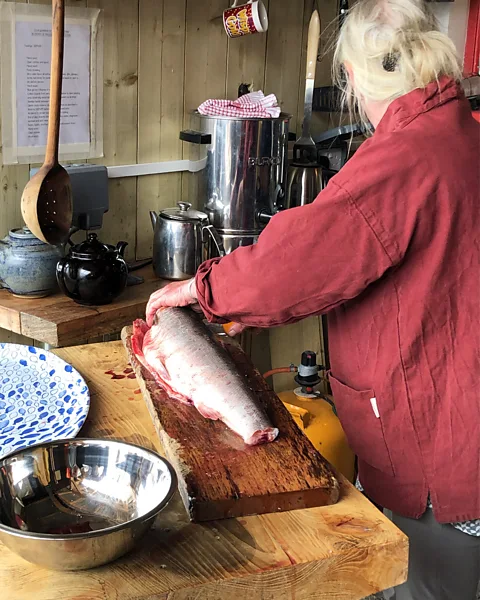Kate Ryan Cold-smoking fish is a labour-intensive process, from the preparation of the fillets to salt curing and smoking (Credit: Kate Ryan)