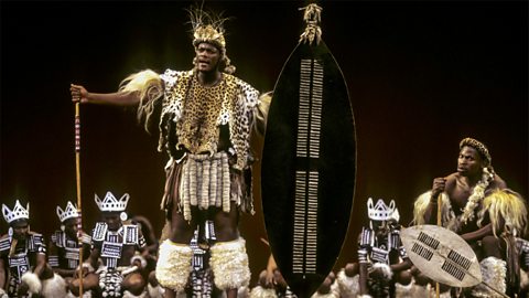 A photograph of South African actor Thabani Patrick Tshanini plays Mabatha (Macbeth) in a 1997 production of Umabatha: The Zulu Macbeth in New York.