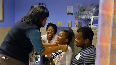 Jahi Chikwendiu/The Washington Post via Getty Images A child is examined at an asthma clinic in Washington, DC (Credit: Jahi Chikwendiu/The Washington Post via Getty Images)