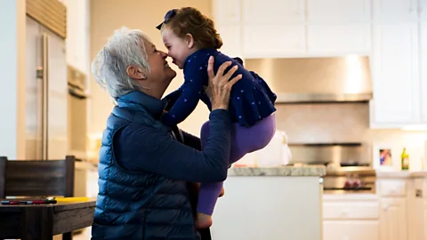 Brooke Fasani/Getty Images Having grandmothers around can bring many advantages to a family (Credit: Brooke Fasani/Getty Images)