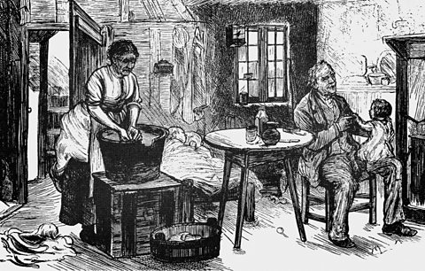 A 19th century engraving showing living conditions during the Industrial Revolution.