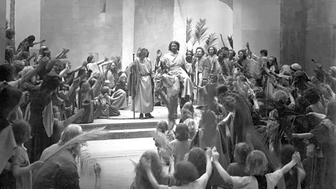 Alamy The play covers all the major beats in the story of Jesus including, in this scene from the 1934 300th anniversary production, his entry into Jerusalem (Credit: Alamy)