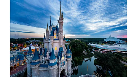 Getty Images Disneyland – just like the Pleasure Gardens centuries before – offers an escape into a world of fantasy (Credit: Getty Images)