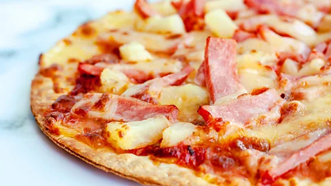 Iamnoonmai/Getty images Ham and pineapple pizza (Credit: Iamnoonmai/Getty images)