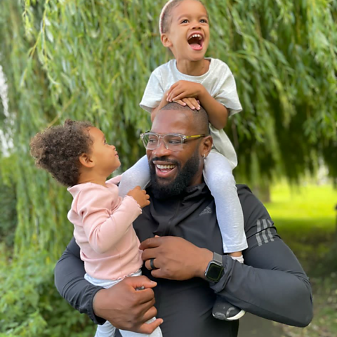 Former rugby star Ugo Monye with his daughters Phoenix and Ruby.