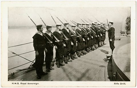 Sailors doing rifle drill on deck onboard HMS Royal Sovereign, circa 1900.