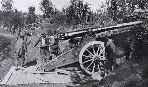 Soldiers and artillery from Serbia and Montenegro bombard the Turkish controlled city of Scutari, Albania, in the First Balkan War of 1912.