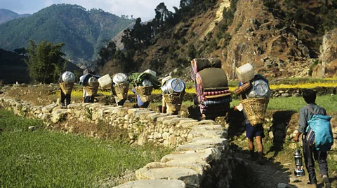 Image Source/Getty Images The Sherpa people came to the Khumbu Beyul in the 15th Century after fleeing conflict in Tibet (Credit: Image Source/Getty Images)