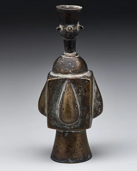 Keir Collection, on loan to Dallas Museum of Art A small bronze bottle originating from 9th to 10th Century Iran has clean lines and geometric motifs (Credit: Keir Collection, on loan to Dallas Museum of Art)