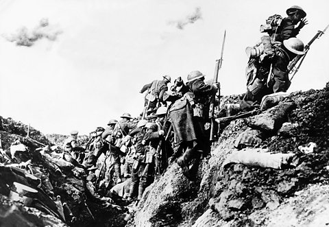 British soldiers go 'over the top' of their trench during the Battle of the Somme, 1916.