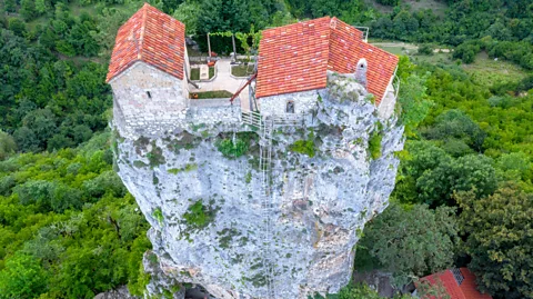 Feng Wei Photography/Getty Images The church on the summit is thought to be one of the world's highest and most isolated churches (Credit: Feng Wei Photography/Getty Images)