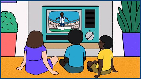 Image: watching Laurie play on the TV