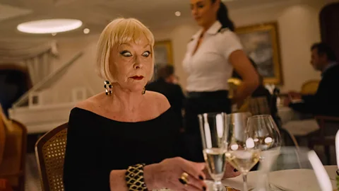 Alamy Set on a luxury cruise liner, Triangle of Sadness uses gross-out scenes of vomiting and more to satirise social conventions and overconsumption (Credit: Alamy)