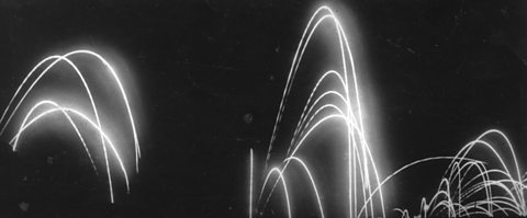 Star shells being fired at night to illuminate no man's land near Beaumont-Hamel during the Battle of the Somme, 1916.