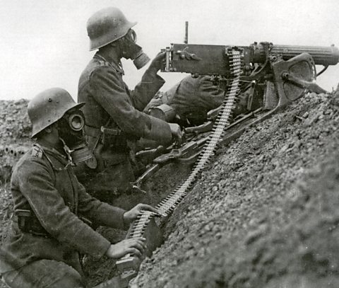 A German machine gun unit defending trenches during World War One. 