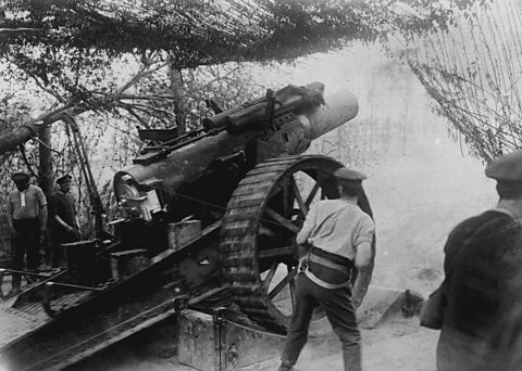 British gunners fire Howitzers during the bombardment of German trenches on the first day of the Battle of the Somme 1916.