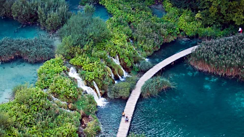 Paul Biris/Getty Images Plitvice Lakes National Park travertine lakes and tumbling waterfalls make it one of Croatia's most popular tourist attractions (Credit: Paul Biris/Getty Images)