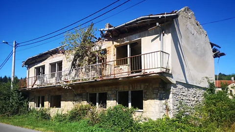 Debbie Rolls A stroll through the small town took me past shell-marked, dilapidated buildings – reminders of a less tranquil past (Credit: Debbie Rolls)