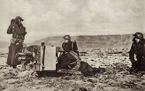 An American machine gun crew targeting German forces, France, 1918.