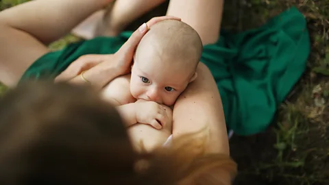 Catherine Delahaye/Getty Images Breastfeeding has been linked to a lower risk of SIDS (Credit: Catherine Delahaye/Getty Images)