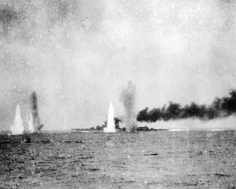 A battleship under bombardment during the Battle of Jutland.