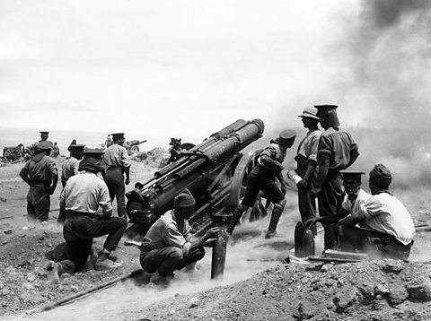 Allied heavy artillery in action on top of a cliff at Helles, Gallipoli, WW1.