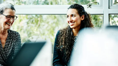 Getty Images Reverse mentoring schemes should be a two-way conversation, to help groups learn from each other (Credit: Getty Images)