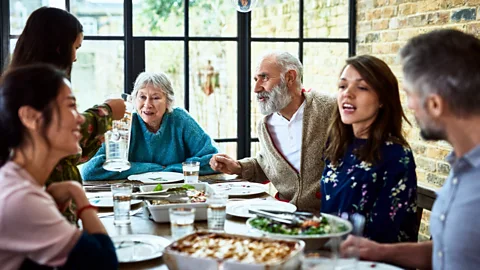 Getty Extended family having a meal