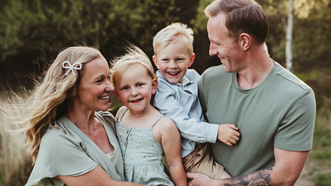 April, her husband and children.