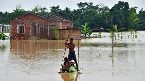 Biju Boro/AFP/Getty Images Flooding in Bangladesh, India and Pakistan have displaced millions of people in 2022 (Credit: Biju Boro/AFP/Getty Images)