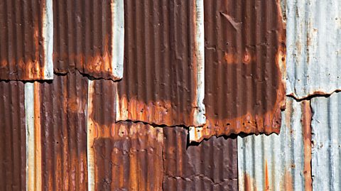 Rusting corrugated iron sheets