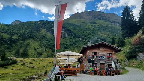 Sophie Hardach The Furtalm farm and restaurant in South Tyrol, surrounded by waterfalls, harnesses the power of Alpine streams to generate its electricity (Credit: Sophie Hardach)