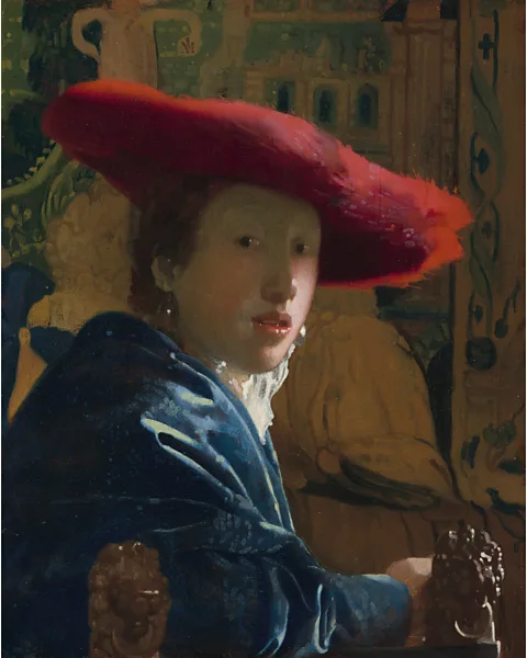 National Gallery of Art Girl with the Red Hat is attributed to Vermeer; the painting (1669) is believed to have inspired the painter of Girl with a Flute (Credit: National Gallery of Art)