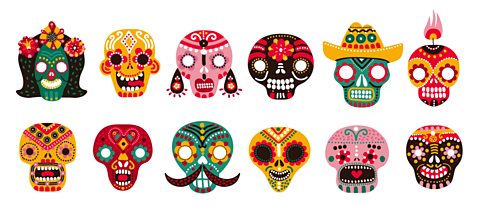 Twelve different skeleton heads decorated in bright colours and patterns for Dia de Muertos.