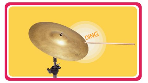 Hitting a cymbal gently makes a quiet sound.