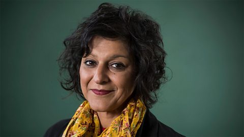 A photograph of comedian Meera Syal wearing a yellow scarf against a green background