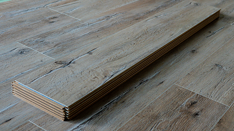 An image of a piece of laminate used to cover a floor.