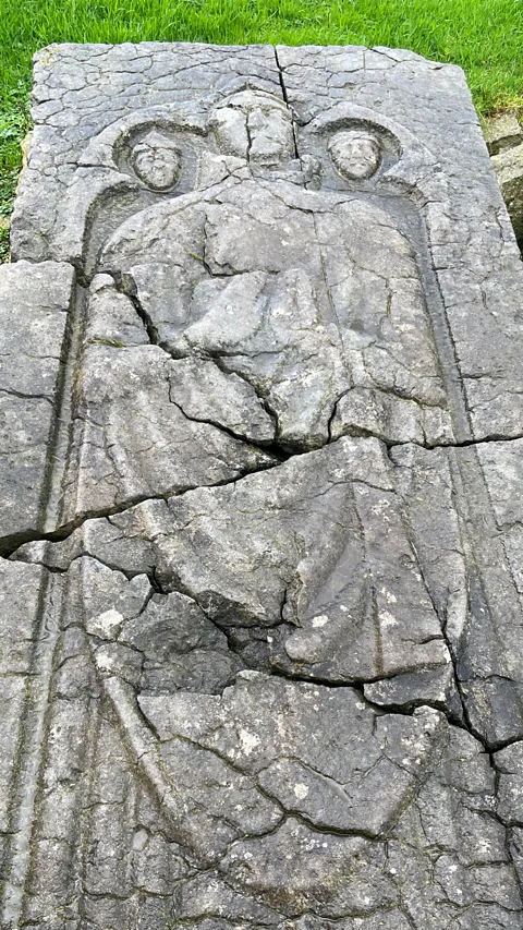 SJ Velasquez An effigy depicting two knights guarding St Nick sits in the Jerpoint cemetery (Credit: SJ Velasquez)